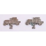 Two 1920's Middle East No2 RAF Armoured Car Company Badges, white metal badges in the form of an