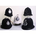 Five Obsolete Metropolitan Police Helmets,1953-80s period Queens crown black EIIR,black rose top