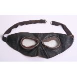 Royal Naval Air Service Issue Goggles, black leather face piece with lenses to the centre. Lined