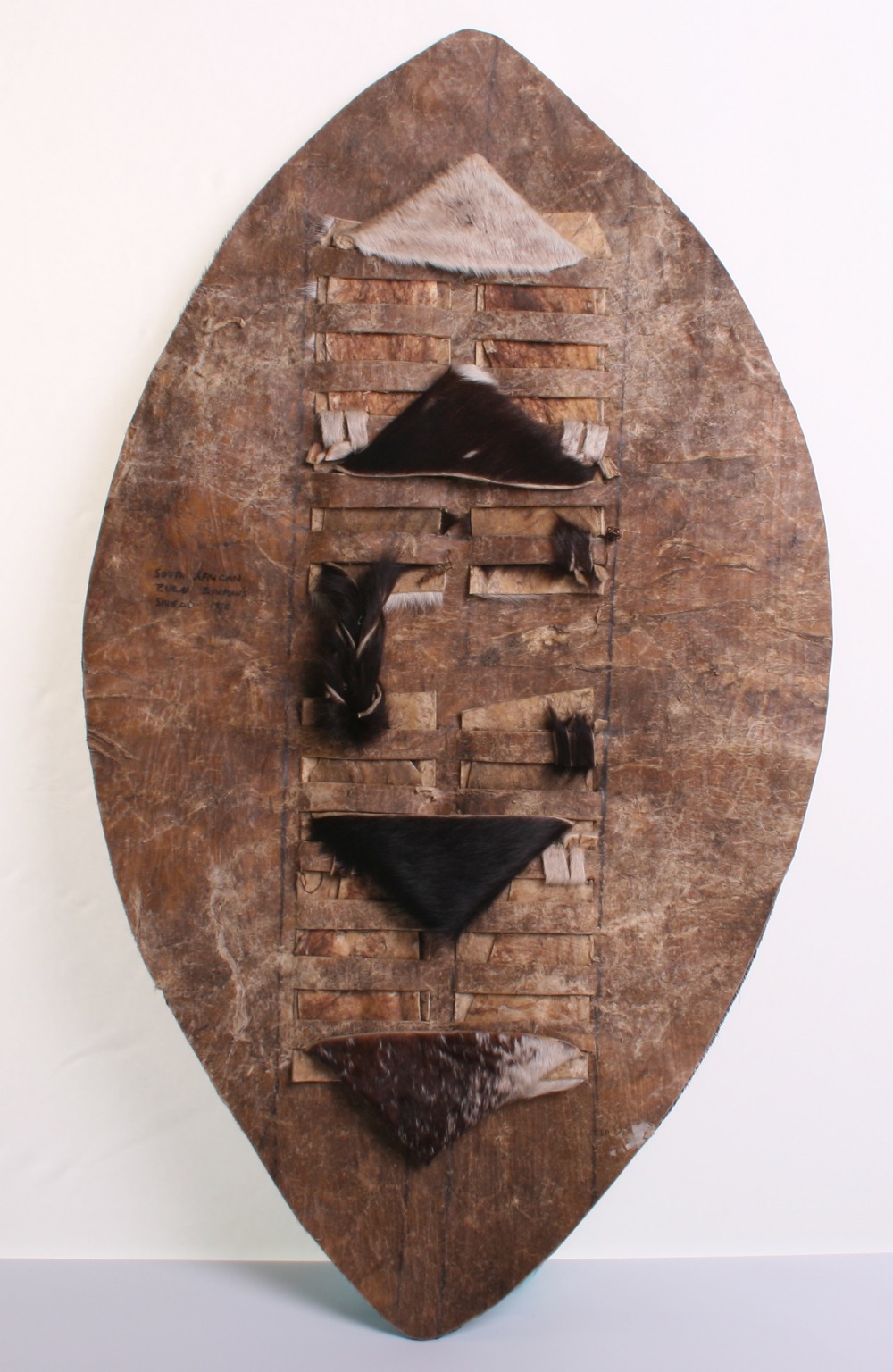 20th Century Zulu Shield, of animal hide with much of the original brown and white fur to the front. - Image 2 of 2