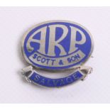 WW2 Home Front ARP Scott & Son Lapel Badge of chrome with blue enamel. Bottom of the badge has a