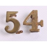 54th (West Norfolk) Regiment of Foot Pork Pie Numerals, of brass with two lug fittings on the