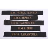 Five Wartime Naval Cap Tallies with gold embroidered wire on black ribbon. Most appear to be of