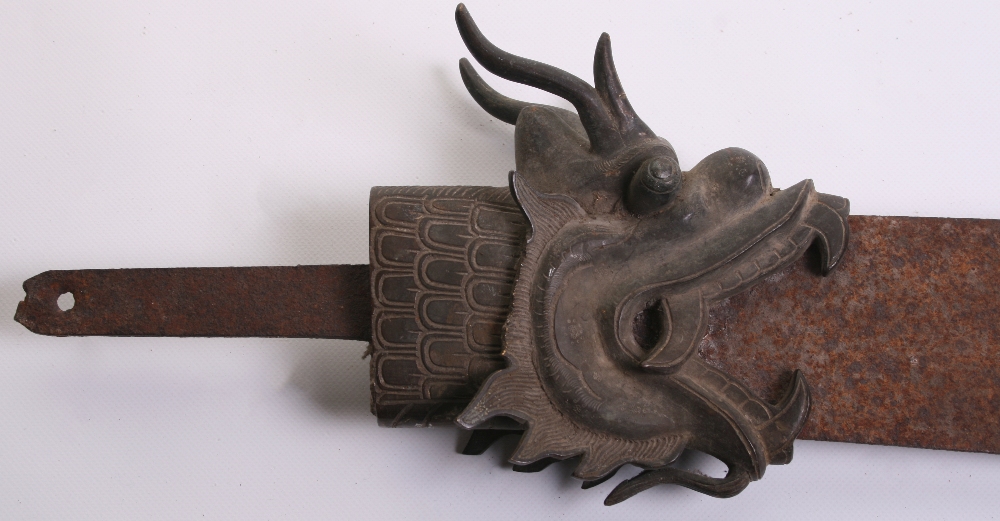The Head of a Chinese Polearm, glaive-shaped blade 27" emanating from the mouth of a brass dragon,