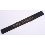 Scarce Royal Navy Cap Tally HMS BARHAM, gold wire embroidered on black ribbon. WW2 period example