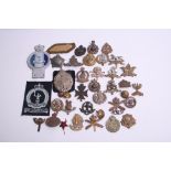Selection of British Regimental Cap Badges of various regiments including East Yorkshire, York and