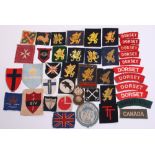 Selection of Dorset Related Cloth Insignia, including 8 embroidered cloth shoulder titles, 2 printed