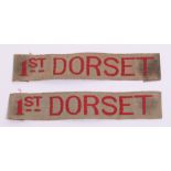 Scarce WW1 1916 Tropical 1st Dorset Cloth Shoulder Titles, red woven embroidery on khaki silk tapes.