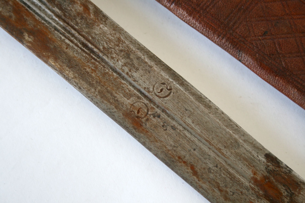 Sudanese Sword Kaskara complete with its original leather covered scabbard. Steel cross piece with - Image 2 of 3