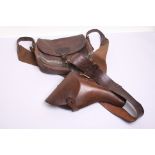 British Officers Equipment consisting of brown leather Sam Browne belt with its pistol holster,