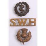 Great War Scottish Woman's Hospital Badge Grouping consisting of bronze cap badge with two lug