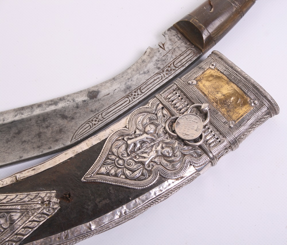 Indian kukri, blade 11", horn grip with brass mounts. In its silver mounted sheath with gold panel - Image 2 of 3