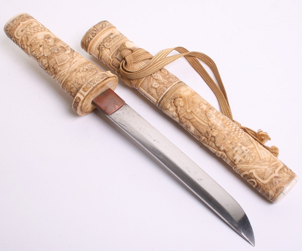 Japanese Carved Bone Dagger Tanto, blade 18.2cms (not tempered), hilt and sheath carved with various - Image 4 of 6