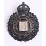 Isle of Wight Police Helmet Badge, black  wreath, Kings crown, white metal castle centre, complete