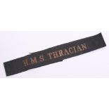 Royal Navy HMS THRACIAN Cap Tally gold wire embroidered on black ribbon. WW2 period example with