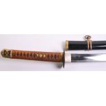 WW2 Japanese Naval Officers Sword complete with its original black lacquered scabbard. Plain tsuba