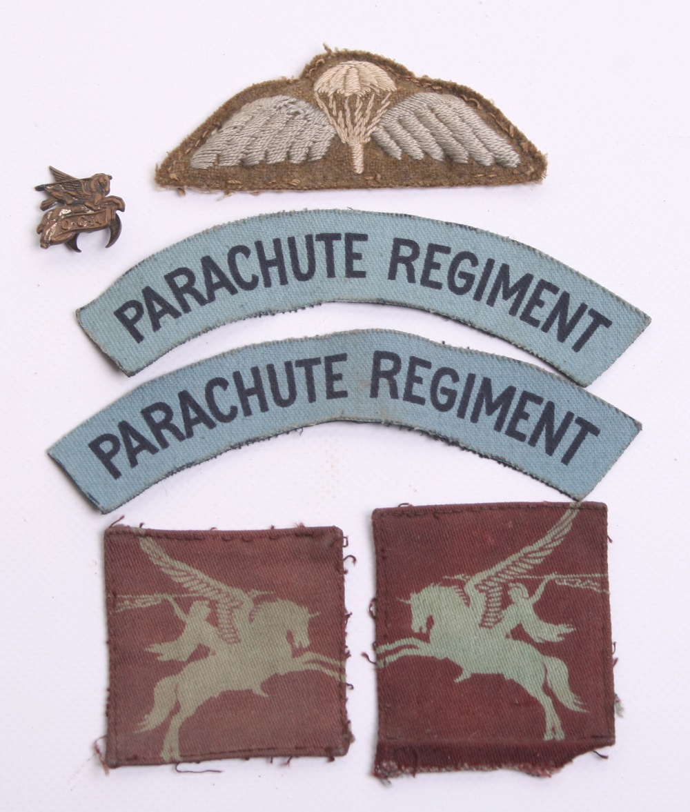 WW2 British Airborne Parachute Regiment Insignia Grouping consisting of matched pair of uniform