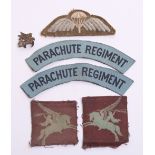 WW2 British Airborne Parachute Regiment Insignia Grouping consisting of matched pair of uniform