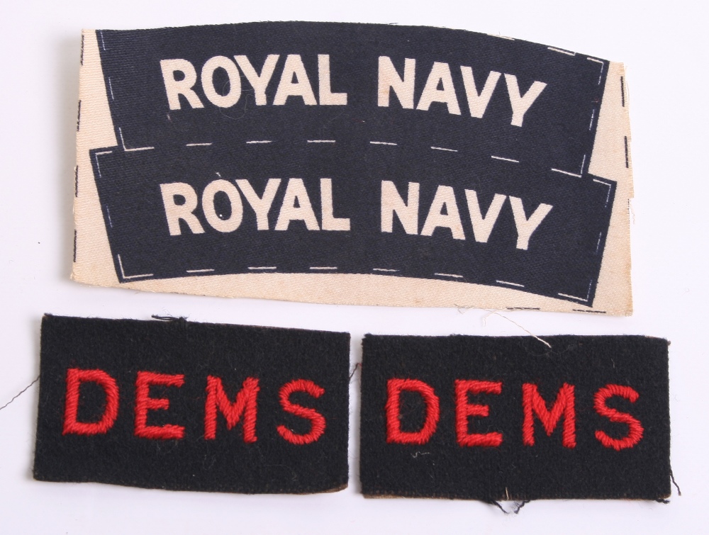WW2 D.E.M.S (Defensively Equipped Merchant Ships) Titles, being red embroidered lettering on dark