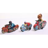 Haji Japan Tinplate Lady Motorcycle, red bike, tin printed detail including lady with yellow top,