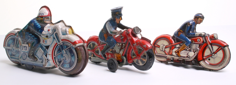 Three Tinplate Police Motorcycles, Philip Neidemeir (Germany) red bike, with tin printed detail,