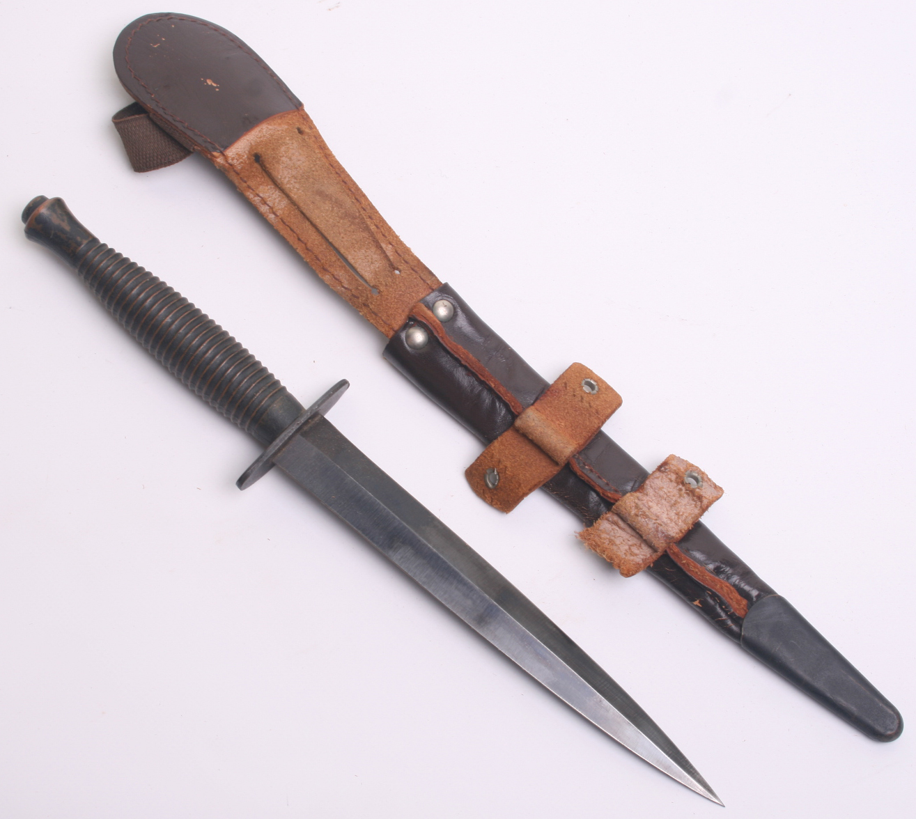 WW2 British 3rd Pattern Commando Knife, complete with its original leathers scabbard. Cross guard is - Image 5 of 5