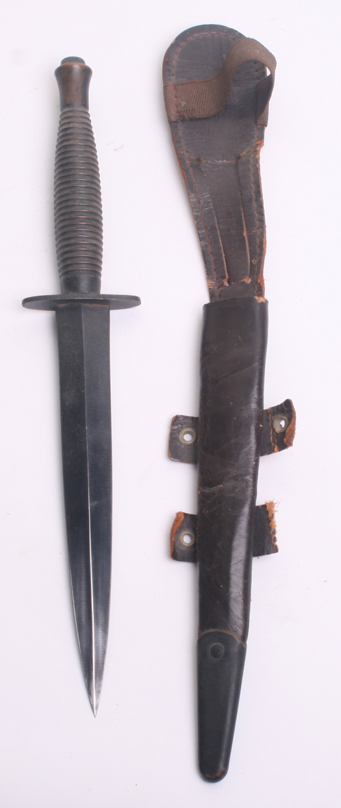 WW2 British 3rd Pattern Commando Knife, complete with its original leathers scabbard. Cross guard is