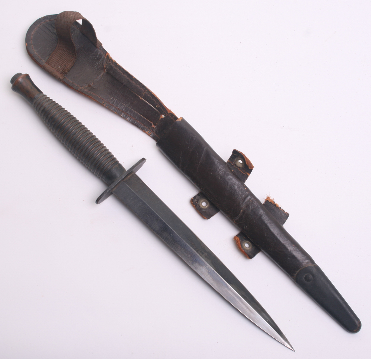 WW2 British 3rd Pattern Commando Knife, complete with its original leathers scabbard. Cross guard is - Image 2 of 5