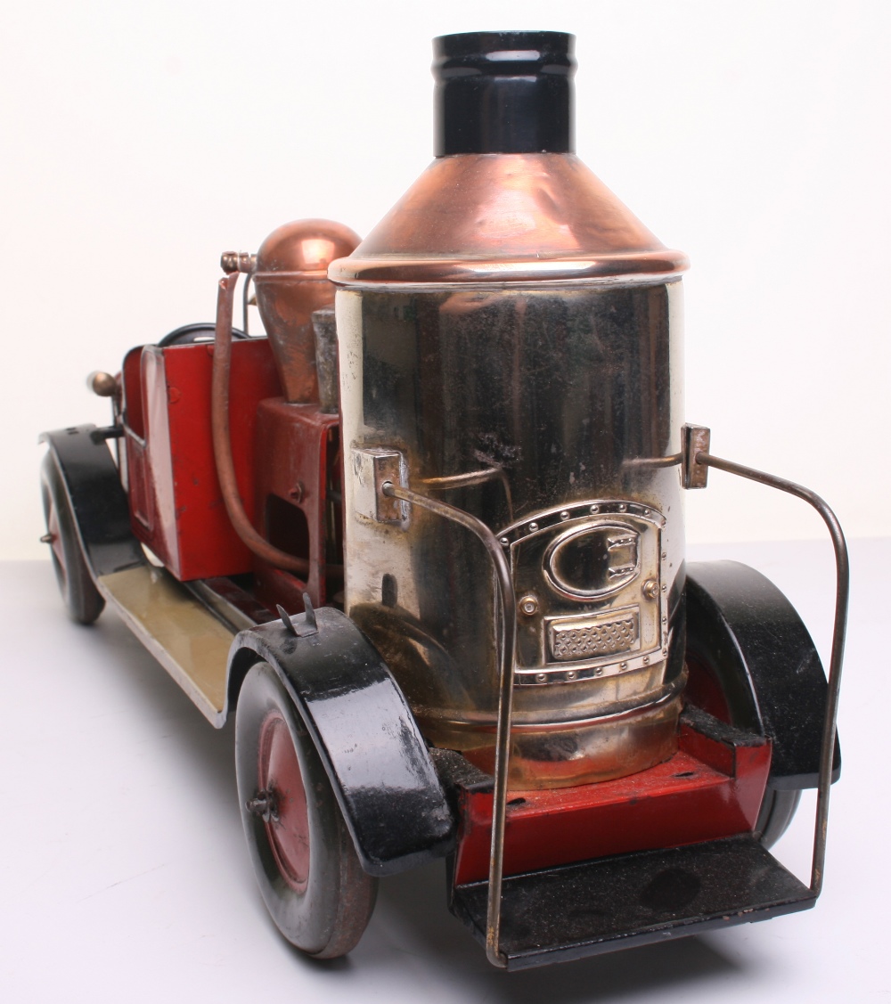 Large scale tinplate c/w Fire Pump with electric light, probably Bing circa 1920, finished in red - Image 3 of 3