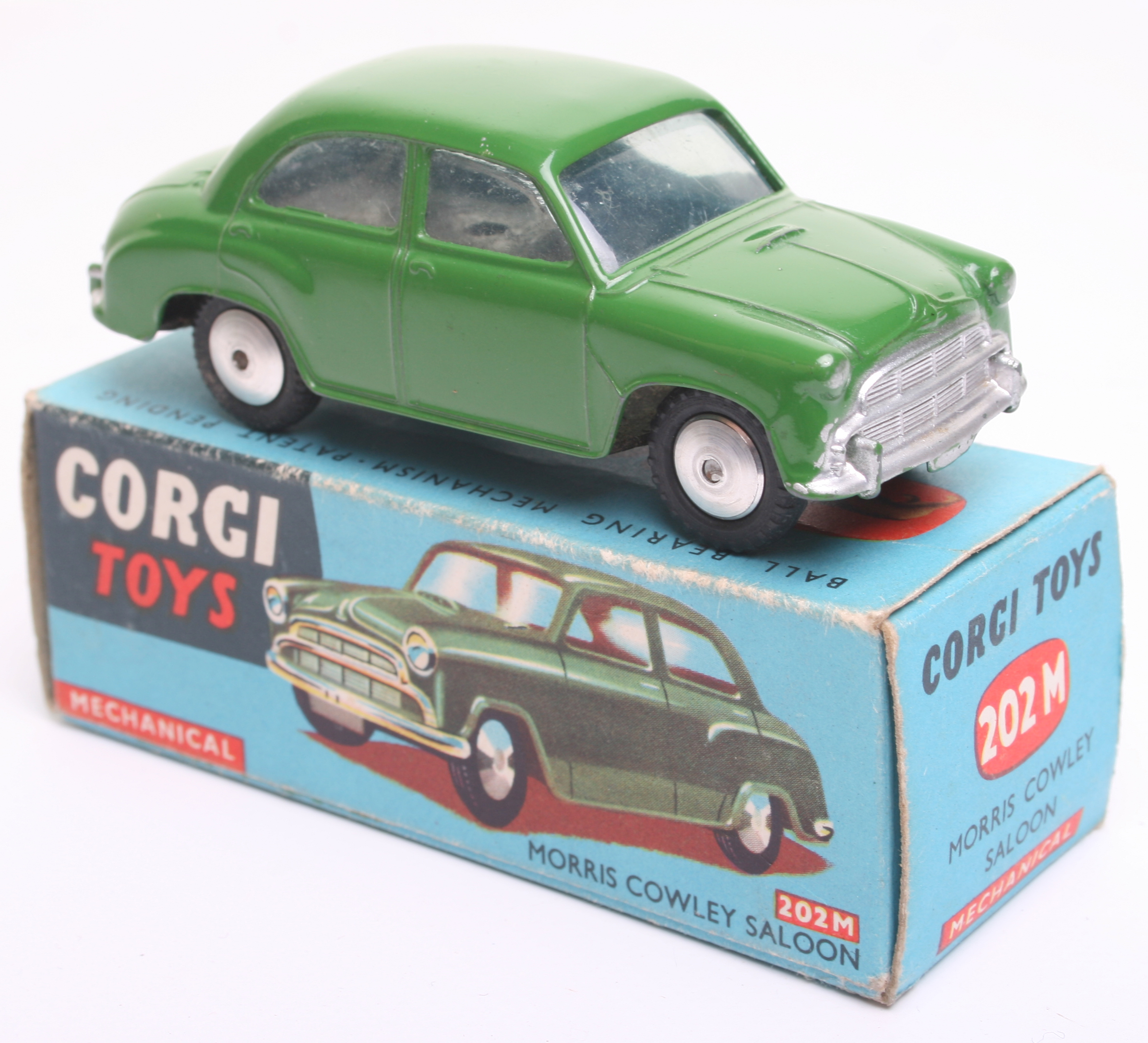 Corgi Toys 202M Morris Cowley Saloon Car, green  body, flat spun wheels,with flywheel motor in