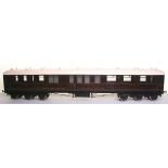 * Two 3 ¼” gauge wooden model Great Northern coaches, late 19th early 20th century, with cast iron