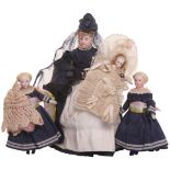 Three German bisque head Dolls House dolls, all with painted features and moulded hair on cloth