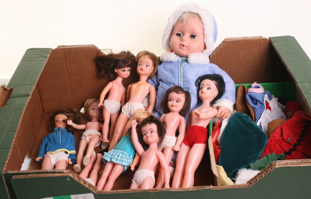 Ten Empire made plastic dolls and a quantity of clothes, all in good condition plus a Tiny Tears