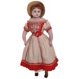 : A Montanari poured wax shoulder head doll, with slightly turned head, blue glass eyes, painted