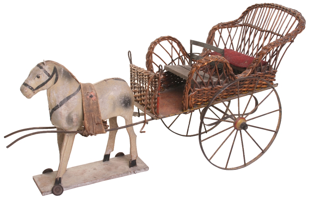 A fine toy horse and open carriage, circa 1880, the dapple grey papier-mache horse on wooden base