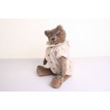 Early German mohair Teddy bear, circa 1910, the straw filled brown mohair bear with black boot