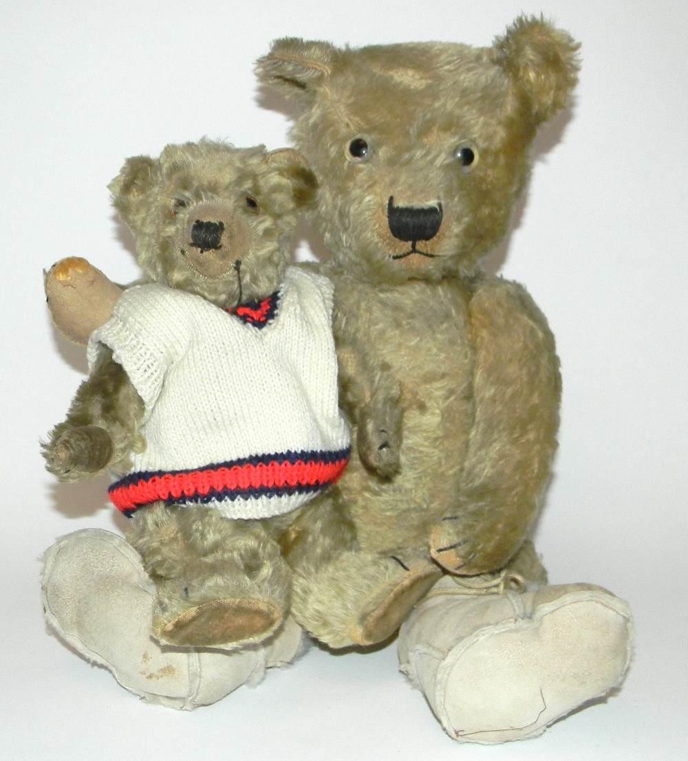 Two English Chiltern Teddy bears, 1930’s, the larger brown mohair bear with glass eyes, stitched