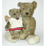 Two English Chiltern Teddy bears, 1930’s, the larger brown mohair bear with glass eyes, stitched