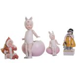 Collection of Heubach bisque Easter figurines, including little girl in Bunny costume standing in