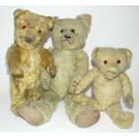 Three English Teddy bears, 1930’s, including a small Merrythought golden mohair bear with glass