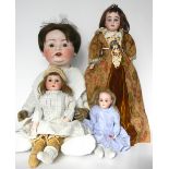 Four German bisque head dolls, including an A.M 3200 shoulder head doll with weighted blue glass