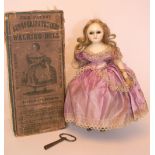 Wax over composition Autoperipatetikos walking doll in original box, German 1860s, with black