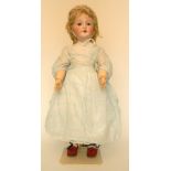 S.F.B.J 301 bisque head doll, French circa 1910, with weighted blue glass eyes, open mouth, upper