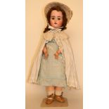 Kestner 192 bisque head doll, German circa 1910, with weighted brown glass eyes, open mouth, and