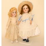 : A.M 390 bisque head doll, German circa 1910, With weighted brown glass eyes, lashes, open mouth,