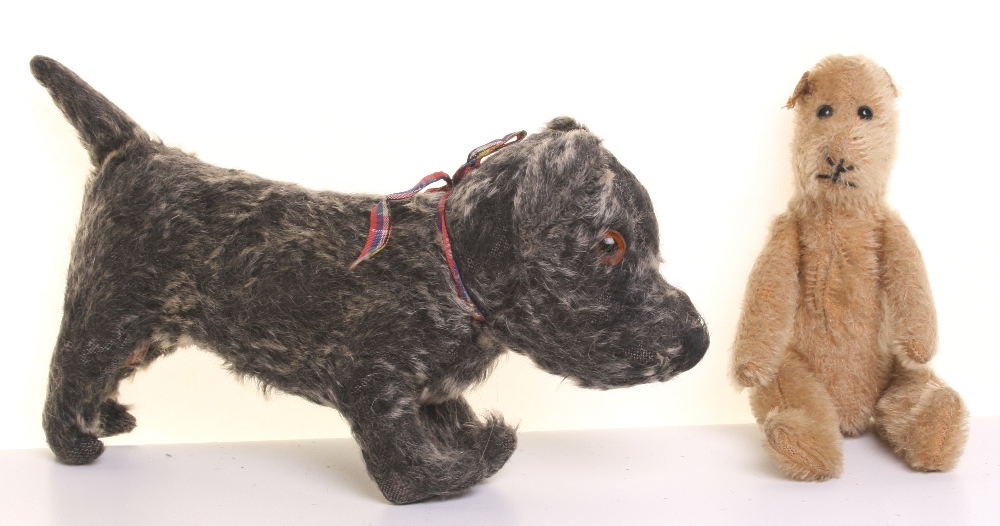 A Chad Valley soft toy Scottie dog and a Teddy Bear, 1920s, black mohair dog with brwn and black