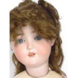 : ‘The Dollar Princess, Special’ bisque head doll, with weighted blue glass eyes, open mouth,