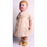 Martha Chase cloth doll, American circa 1905, the stockinette head and body painted with oils,