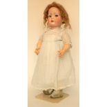 Large Bruno Schmidt 2097 bisque head toddler doll, German circa 1910, with weighted blue glass ‘