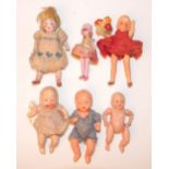 Six miniature dolls 1920’s-30’s, including all-bisque girl with painted features, moulded pink hat